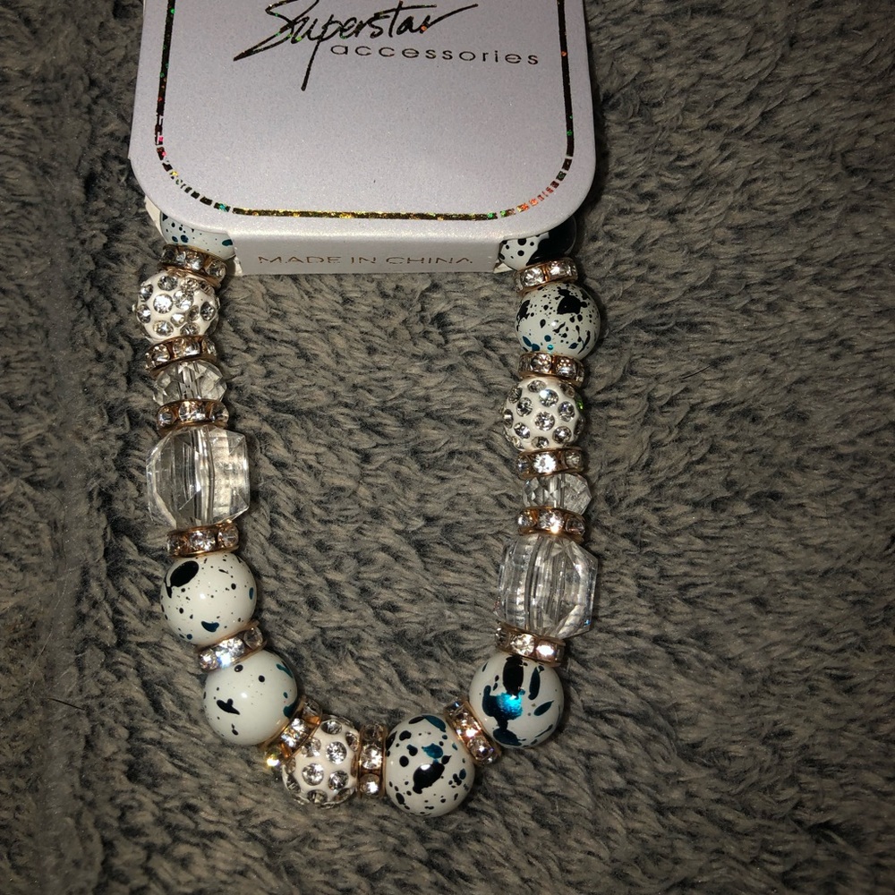 Black, white and teal stretchy bracelet